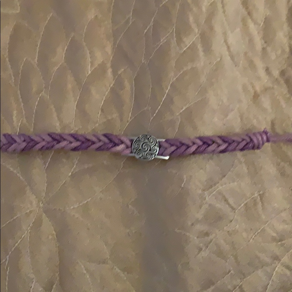 Purple bracelet with charm
